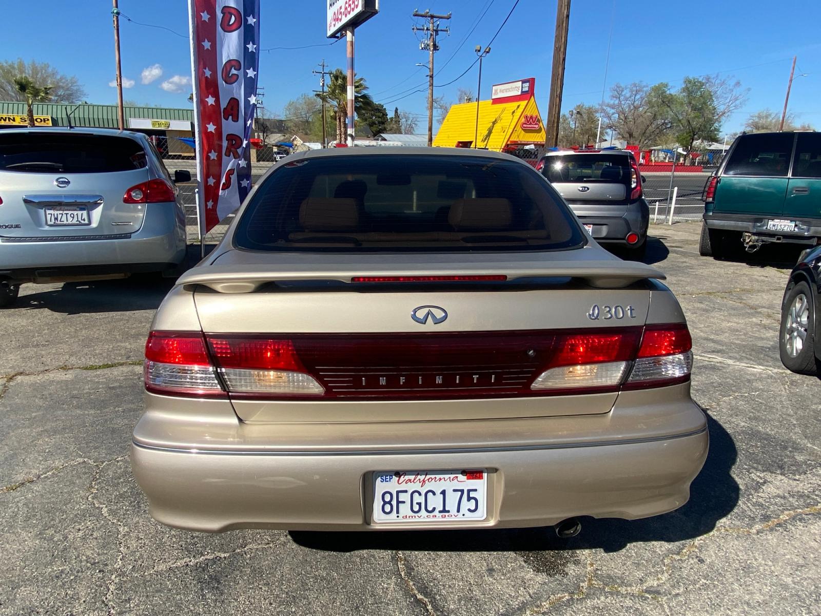 1998 Infiniti I30 Base (JNKCA21A1WT) with an 3.0L V6 DOHC 24V engine, 4-Speed Automatic Overdrive transmission, located at 44356 Date Ave., Lancaster, CA, 93534, (661) 945-6555, 34.688919, -118.139374 - Photo #1